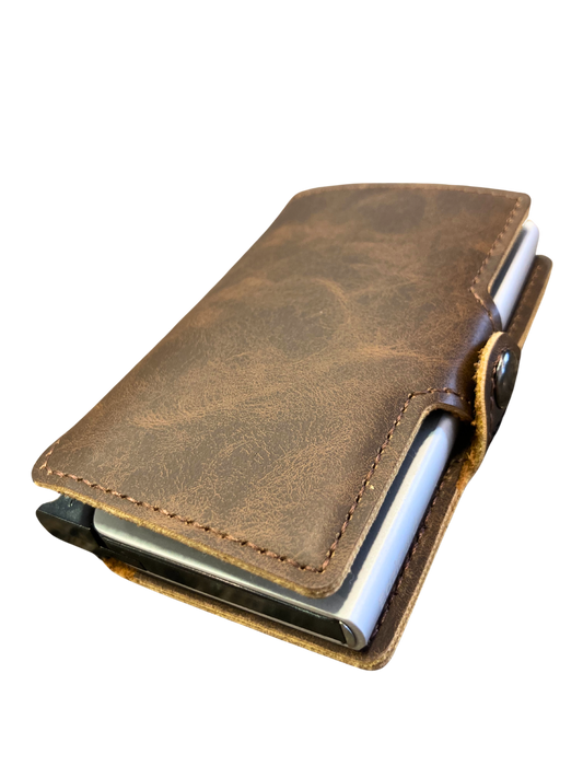 brown leather eazicard wallet featuring a metal casing with RIFD protection.