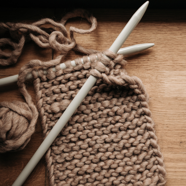 Knit patterns with knitting needles.