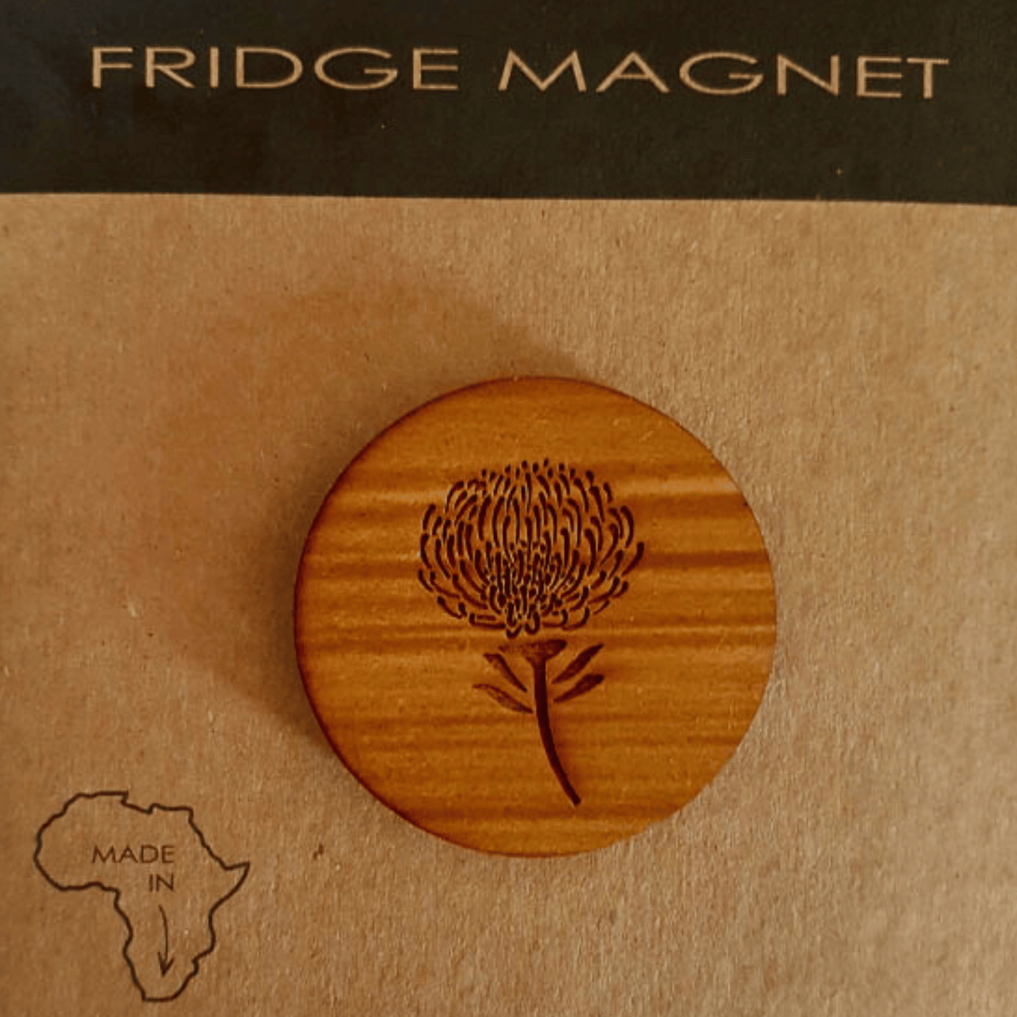 Wooden protea fridge magnet.