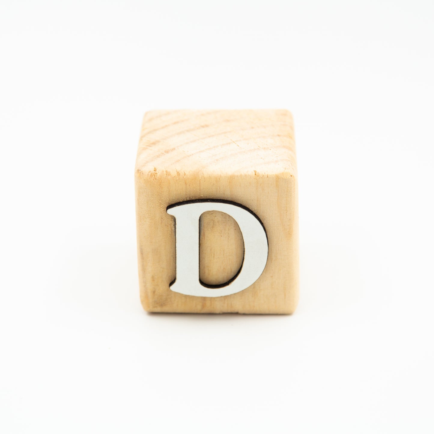 Wooden alphabet letter block D.