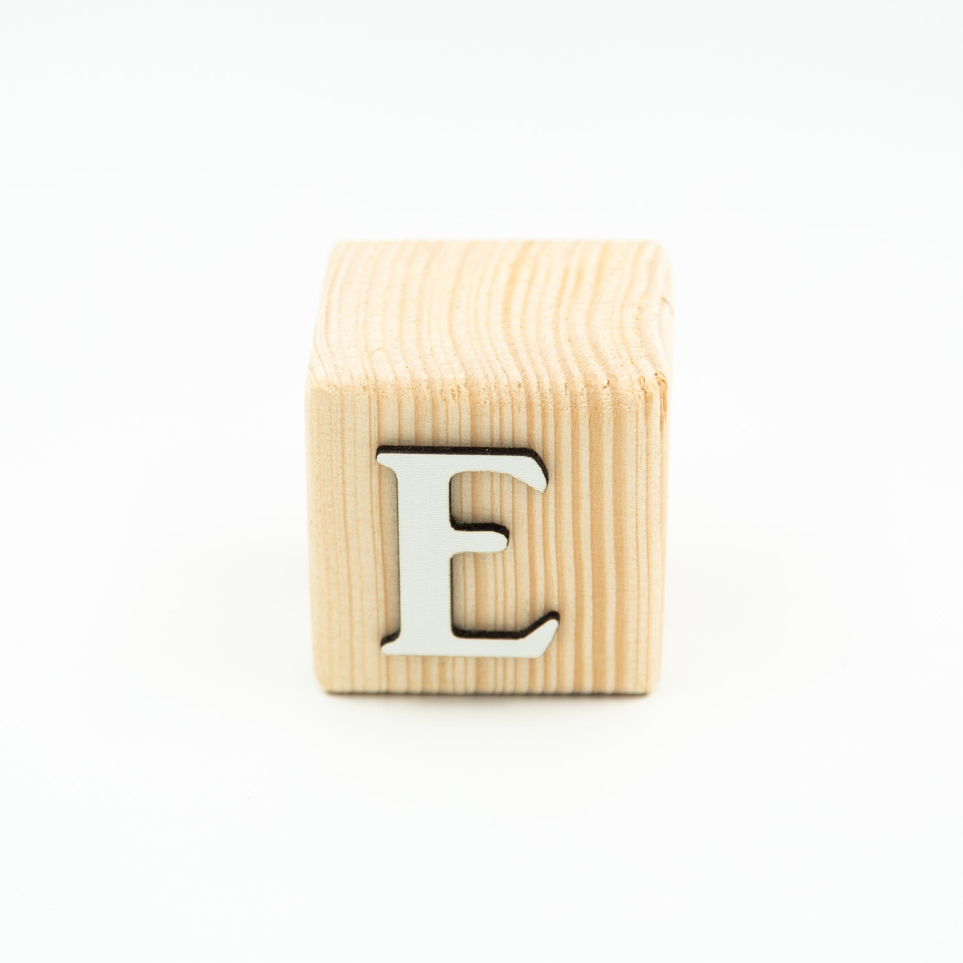 Wooden alphabet letter block E.