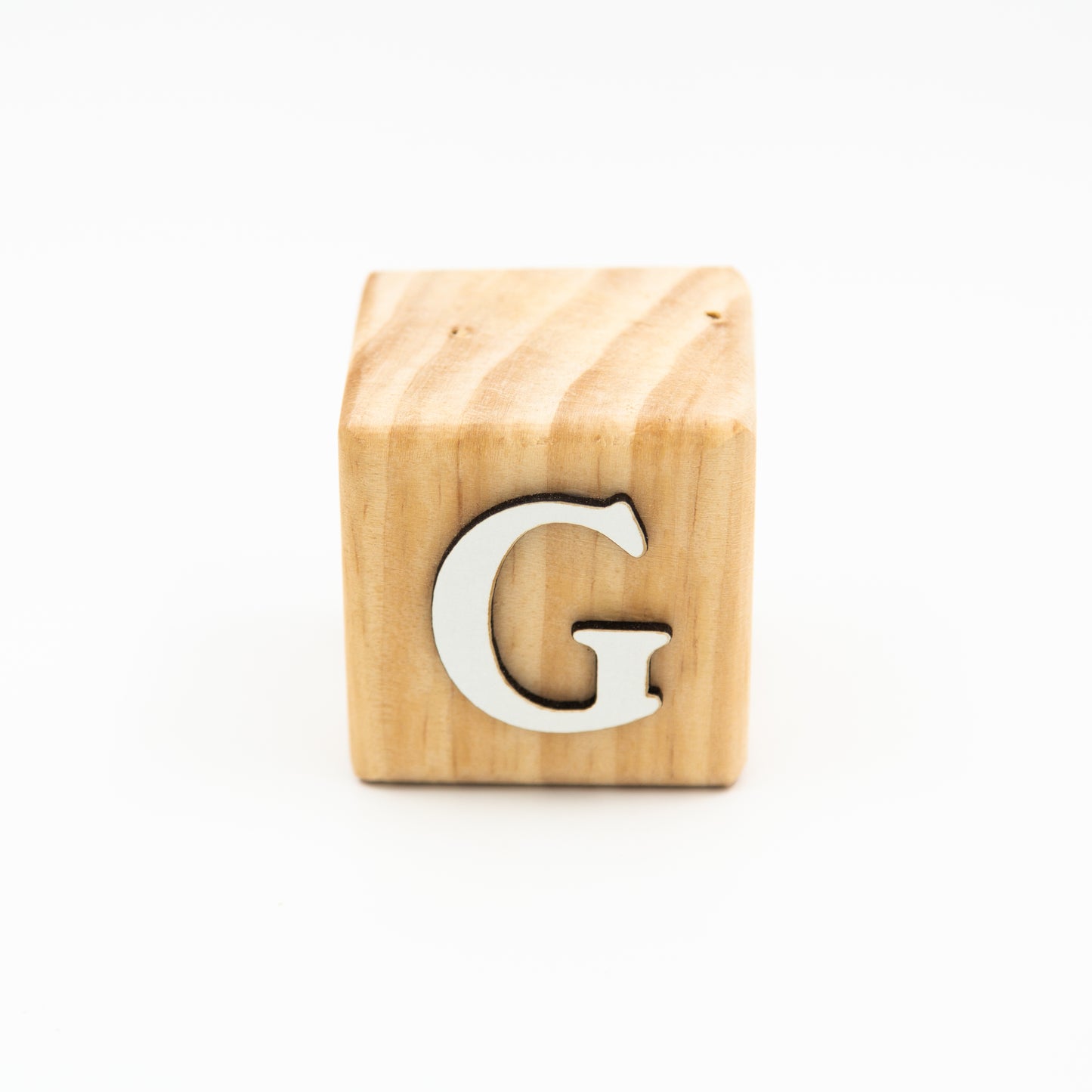 Wooden alphabet letter block G.