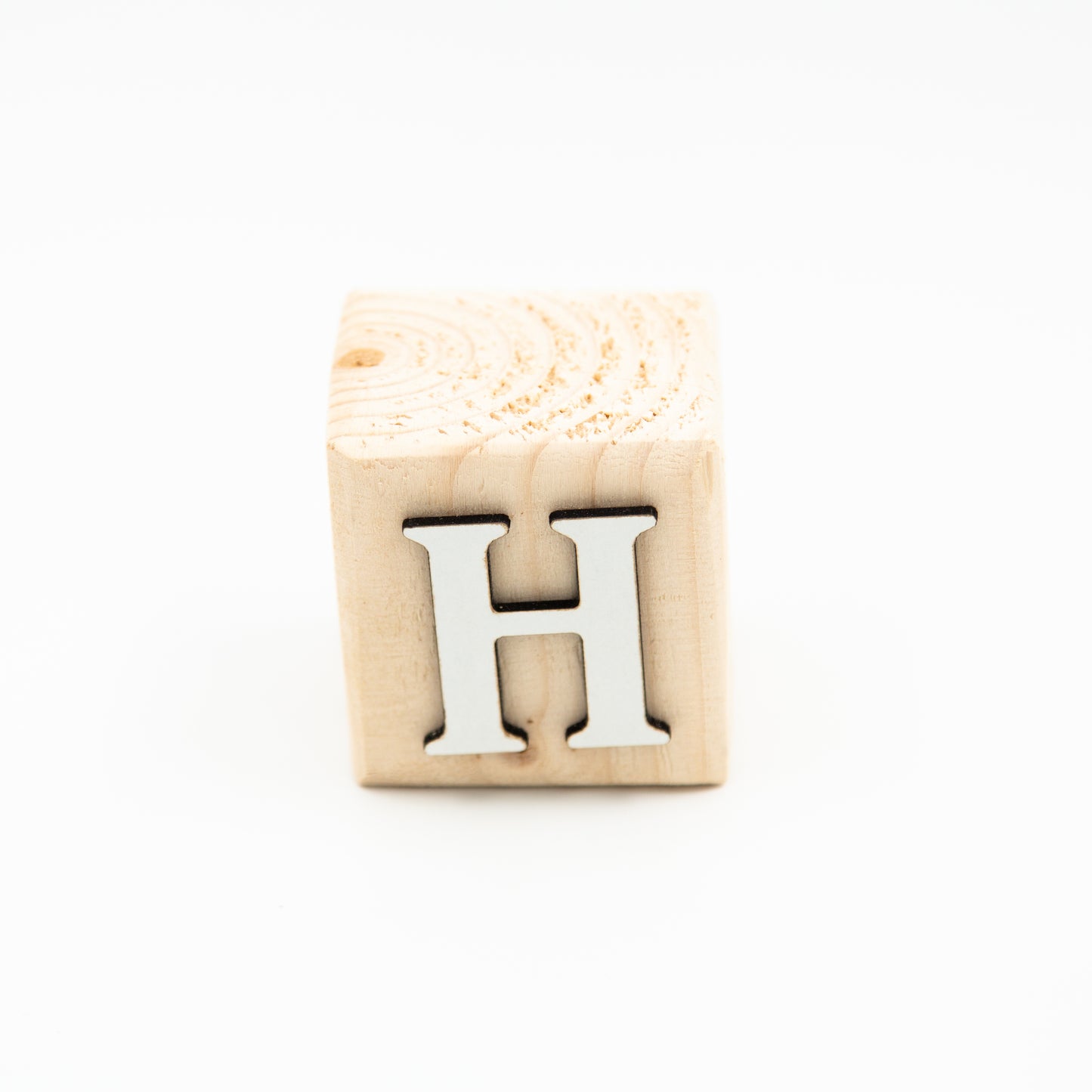 Wooden alphabet letter block H.