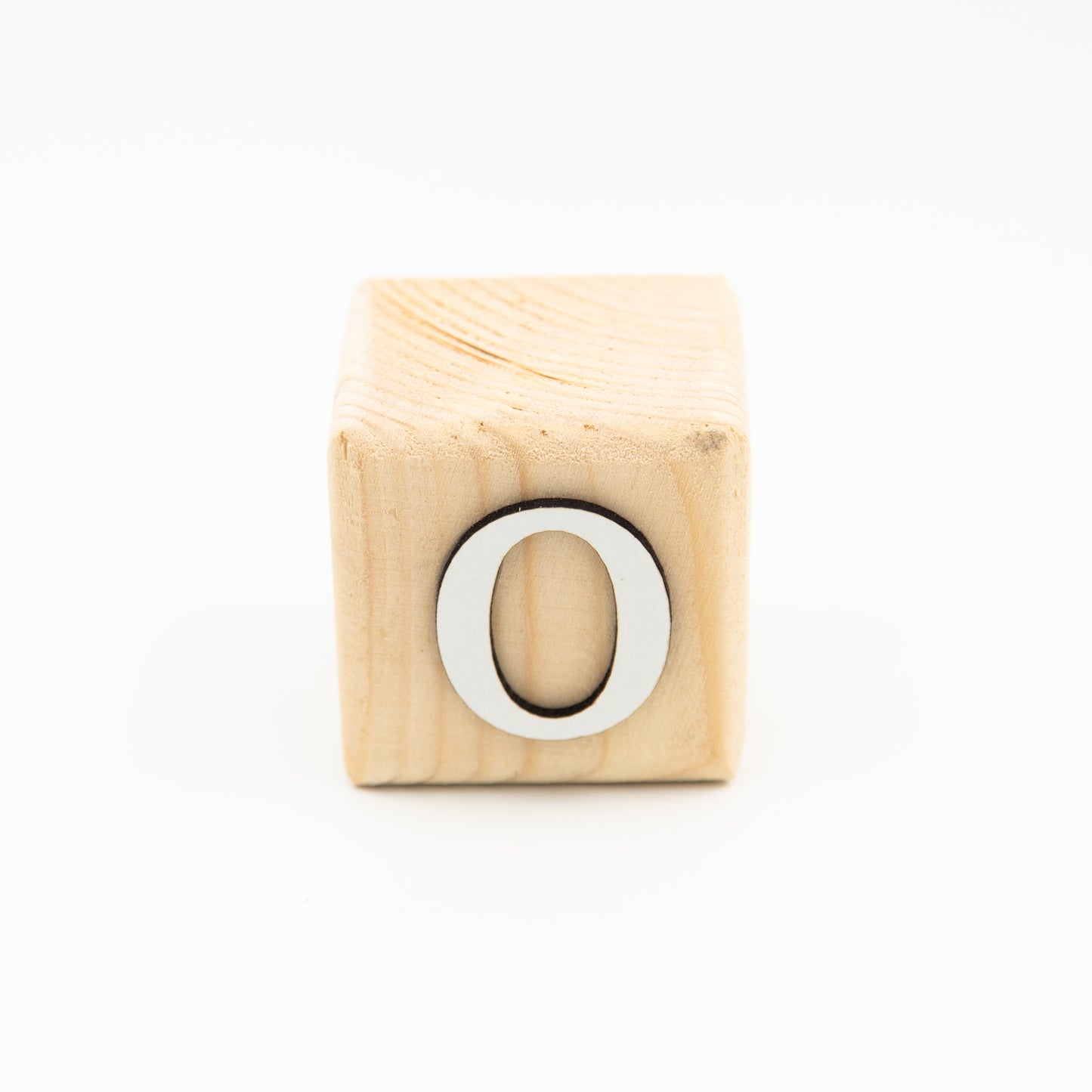 Wooden alphabet letter block O.