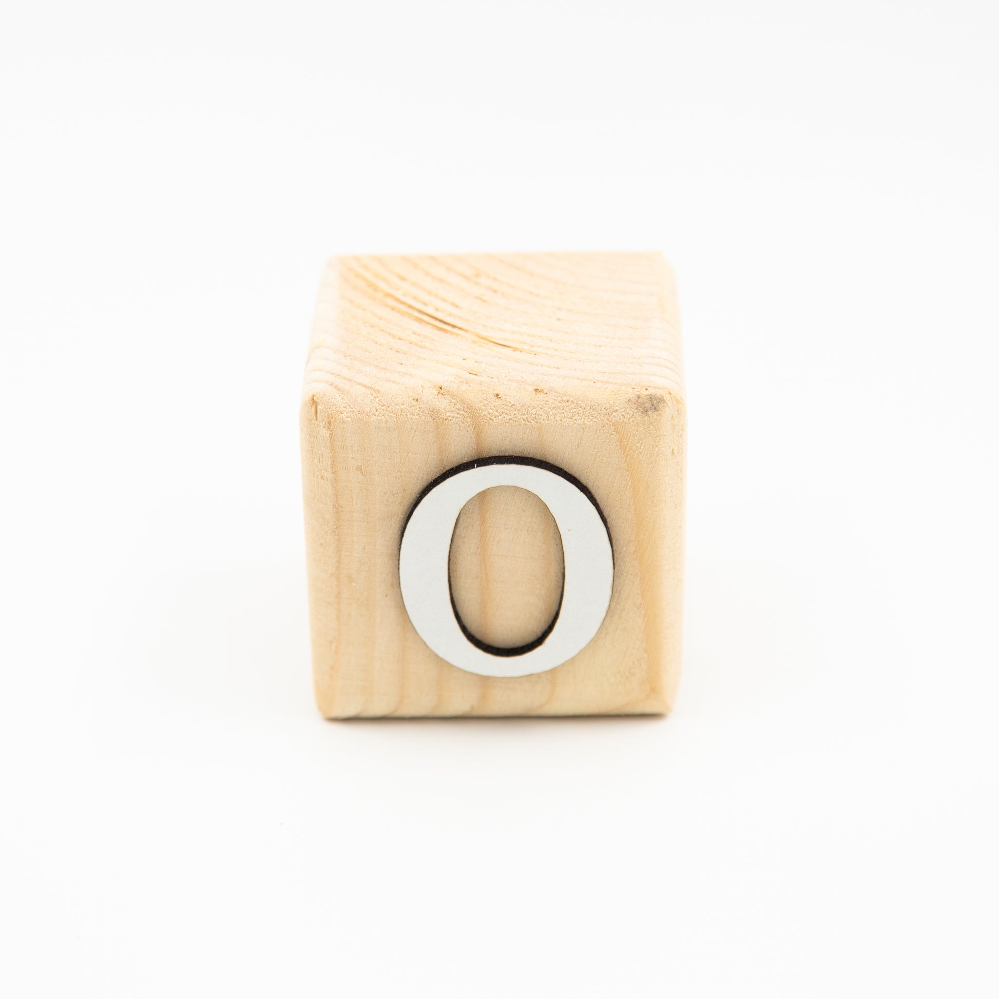 Wooden alphabet letter block O.