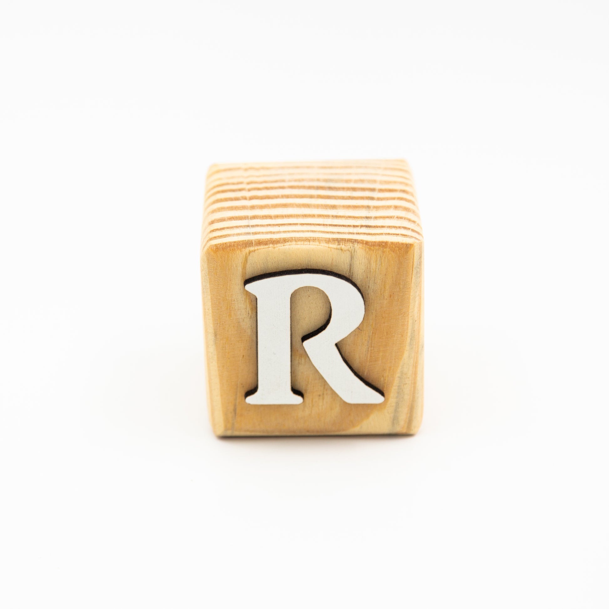 Wooden alphabet letter block R.