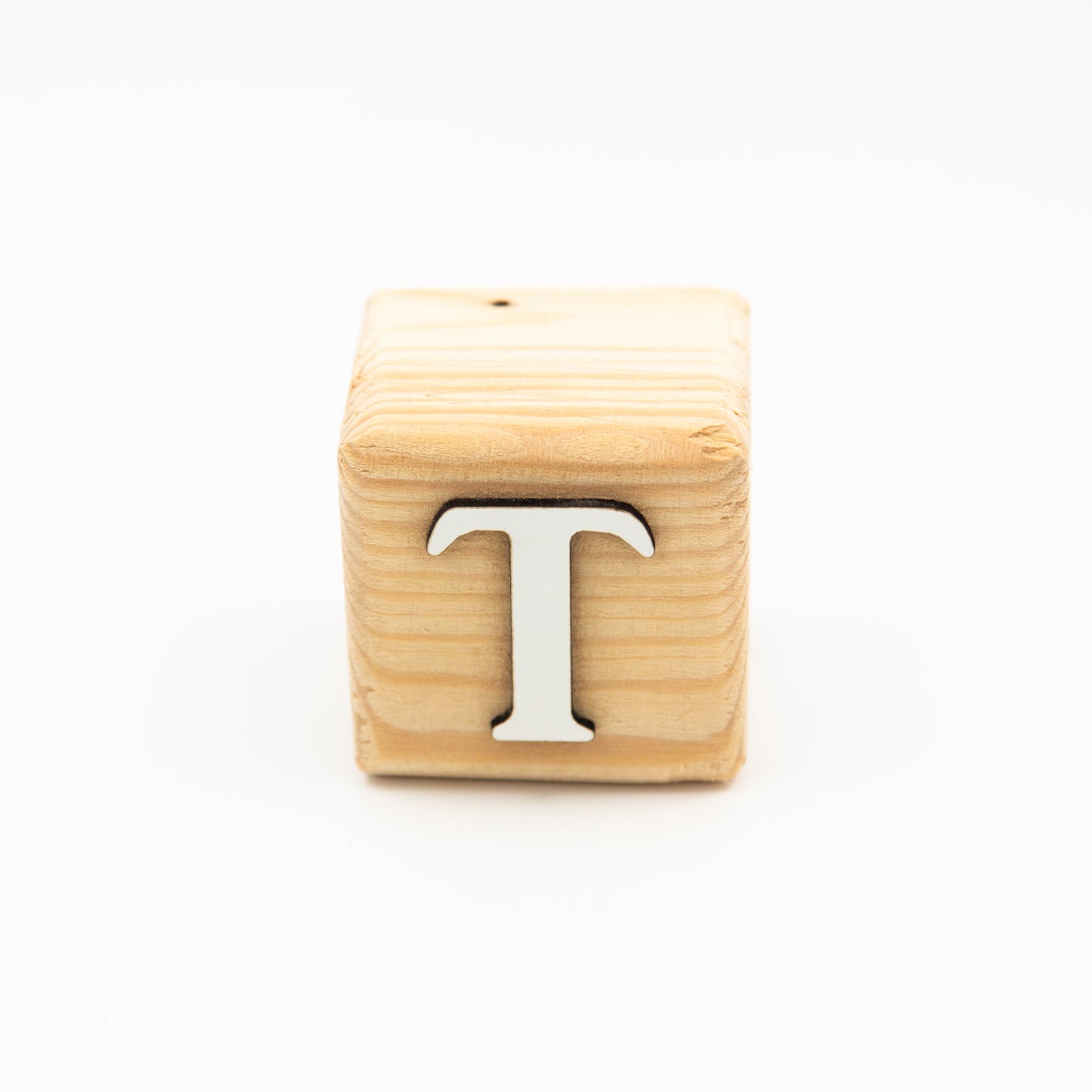 Wooden alphabet letter block T.