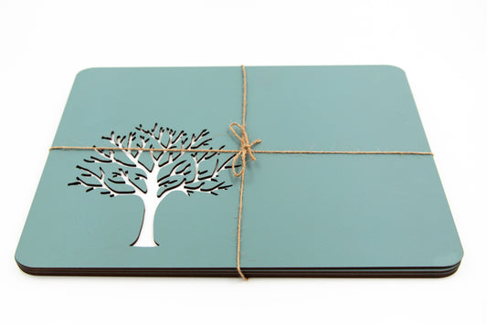 Wooden placemats with a tree of life.