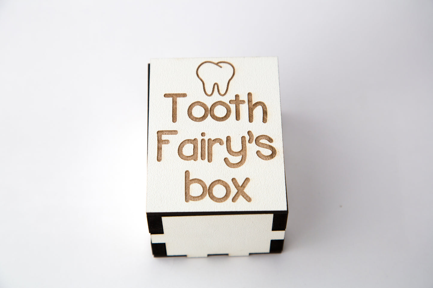 White wooden tooth fairy box.