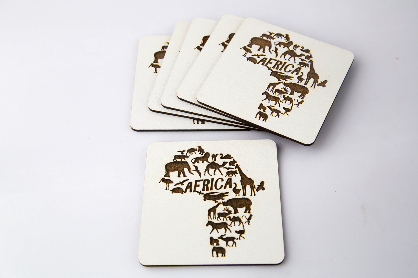 Laser cut wood coaster.