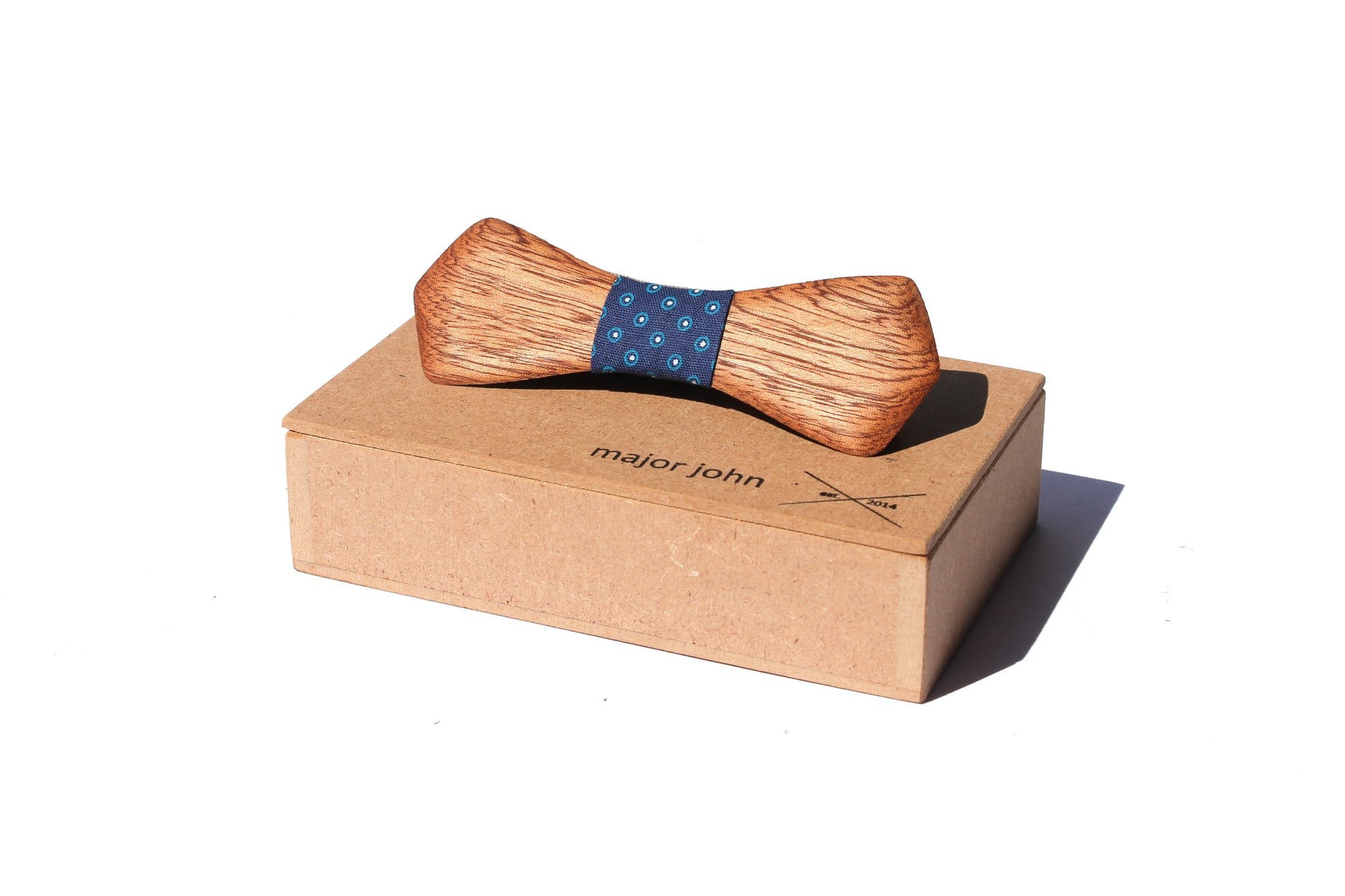 Wood bow tie on gift box.